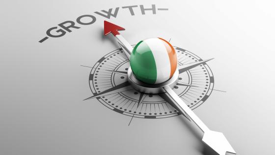 Compass with Irish flag pointing to growth